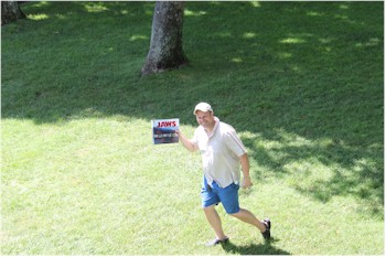 Matt Taylor holding "his book"